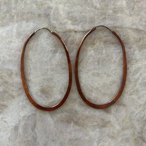 Copper oval hoop earrings